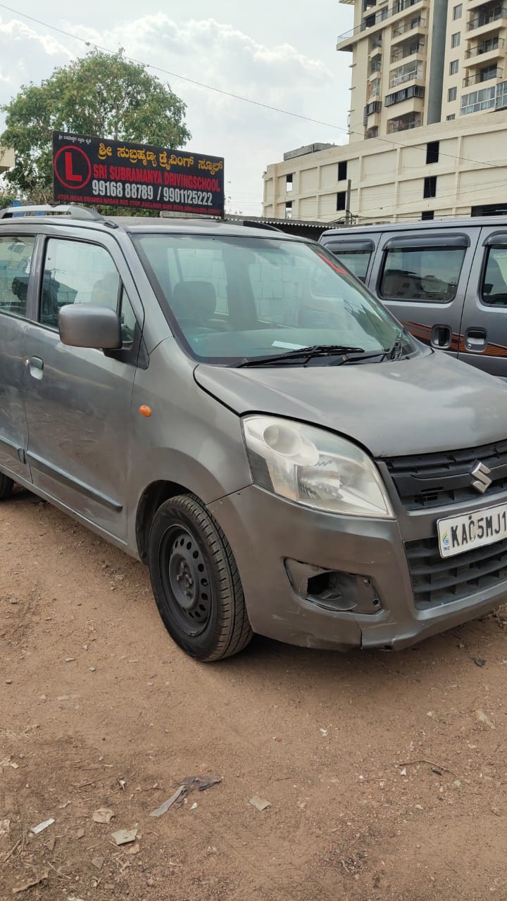 Driving school vehicle parked near training lot